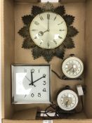 Pair Ferranti two colour Bakelite electric clocks,