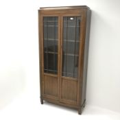 Early 20th century oak glazed bookcase display cabinet, two doors enclosing five glazed shelves,