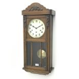 20th century oak wall clock, silvered Arabic dial with glazed door,