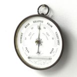 Brass cased circular aneroid barometer with thermometer,