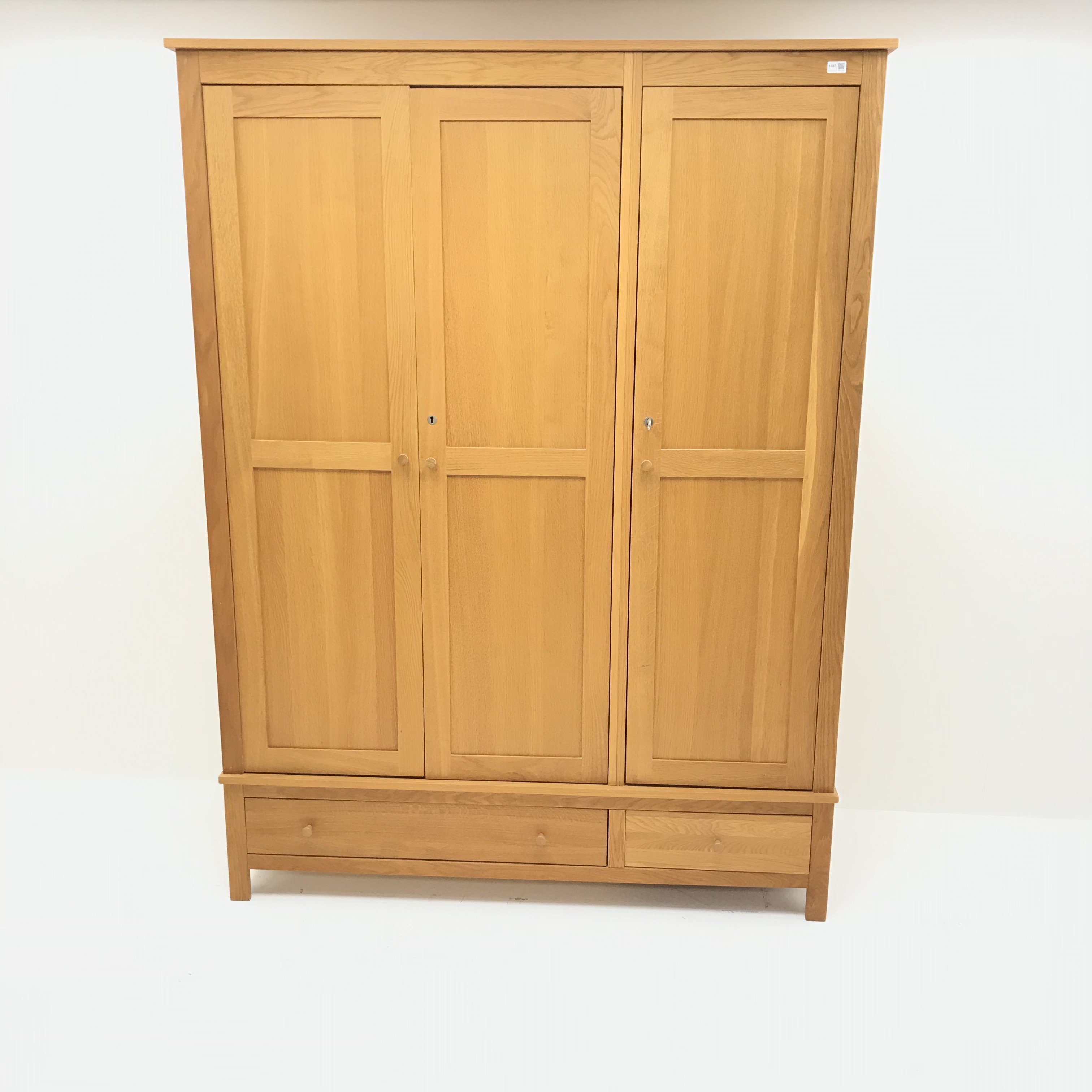 Light oak triple combination wardrobe, three doors above one long and one short drawer, - Image 2 of 4