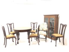 Early 20th century oval mahogany centre table (W107cm, H75cm, D76cm|) an oak bookcase,