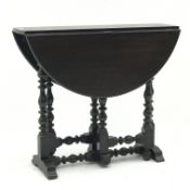 Small 17th century style oak circular gateleg dining table, on baluster turned supports, D83cm,