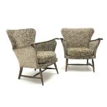 Pair Parker Knoll armchairs, upholstered in a patterned beige fabric,