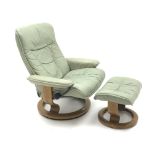 Ekornes Stressless leather upholstered reclining arm chair and stool (2) Condition Report