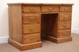 Mid century pine twin pedestal desk, nine drawers, plinth base, W115cm, H77cm,