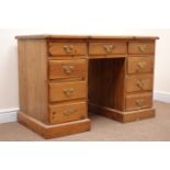 Mid century pine twin pedestal desk, nine drawers, plinth base, W115cm, H77cm,