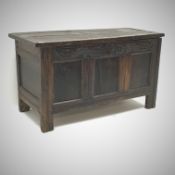 18th Century oak kist, hinged lid, heavily carved frieze, three panel front, stile supports, W122cm,