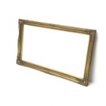 Large rectangular gilt framed wall mirror, W130cm,