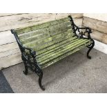 Two seat cast iron garden bench (W131cm) and pair cast iron bench ends Condition Report