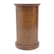 Art Deco style walnut circular pedestal lamp table, single frieze drawer above cupboard,