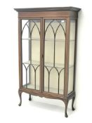 Edwardian inlaid mahogany display cabinet, two doors enclosing two lined shelves,