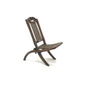 19th century oak folding campaign chair, carved and pierced cresting rail, canework back and seat,