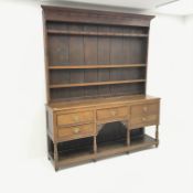 Early 19th century oak dresser, raised three tier plate rack, five drawers,