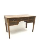 Early 20th century mahogany kneehole desk, five drawers, square tapering supports on spade feet,