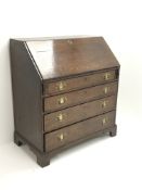 19th century oak bureau fall front enclosing fitted interior with four graduating drawers,