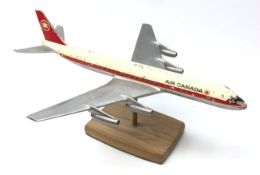 Air Canada advertising diecast model of a Douglas DC-8 Airliner, mounted on wooden base,