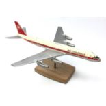 Air Canada advertising diecast model of a Douglas DC-8 Airliner, mounted on wooden base,