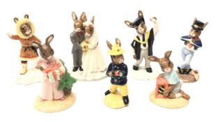 Seven Royal Doulton Bunnykins figures comprising Graduation Day, Fireman, Easter Treat, Eskimo,