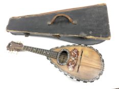Italian bowl back mandolin with mother-of-pearl inlay,