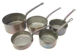 Matching set of four copper saucepans stamped 26, 20 & 18 and French sauté pan,