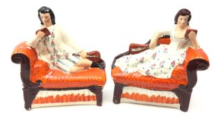 Pair Victorian Staffordshire figures of reclining musicians,