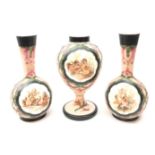 Victorian painted milk glass trio comprising two bottle shaped vases and baluster vase,