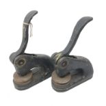 Two early 20th century cast iron desk embossers for Beacon Holidays (2) Condition Report