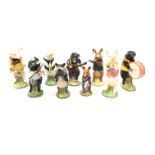 Set of nine John Beswick Pig Promenade figures comprising Christopher, John, Richard, David, Daniel,