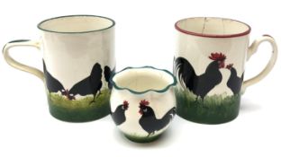 Late 19th century Wemyss tankard painted with a continuous band of Chickens and green borders H14.