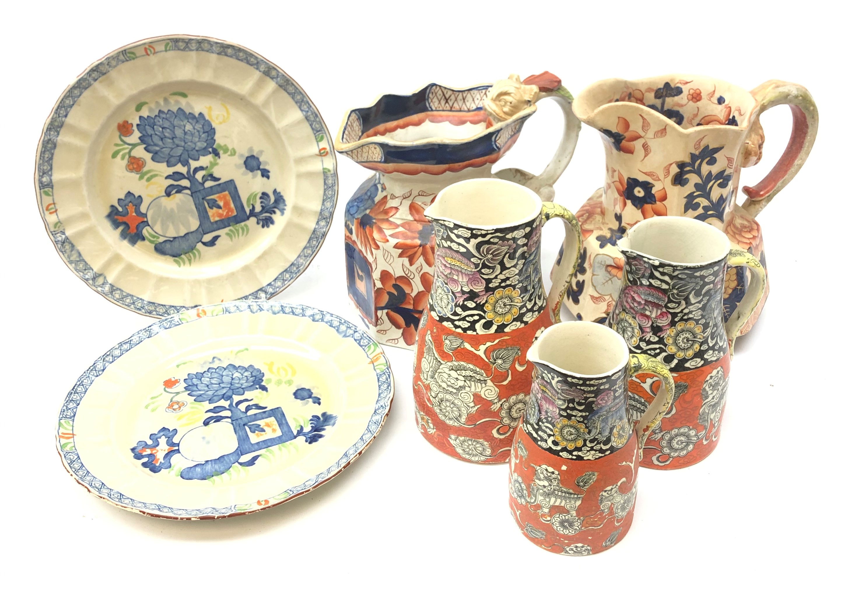 Set of three 19th century Masons graduating jugs with Chinoiserie design, two Masons plates,