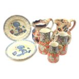 Set of three 19th century Masons graduating jugs with Chinoiserie design, two Masons plates,