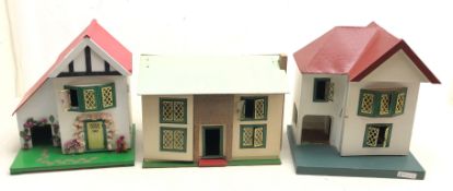 Three 1/16 scale Dolls houses, all having tin plate windows and doors,