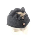 WW2 German Luftwaffe side cap, blue wool with embroidered other ranks pattern eagle and cockade,