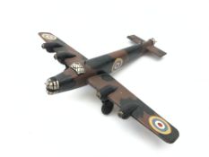 Hand made wooden model of a twin engined WW2 bomber, camouflage painted with roundels,