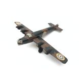 Hand made wooden model of a twin engined WW2 bomber, camouflage painted with roundels,