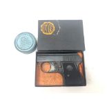 EM-GE top vent black finish starting pistol, with instructions in original box with a tin of 100 No.