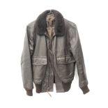 US Air Force style brown leather flying type jacket, buttoned sheepskin collar and twin pockets,