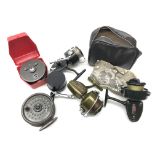 Mitchell spinning reel with spare spool in carrying case, two Intrepid fly reels,