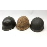 WW2 American M1 Steel helmet, with camouflauged cover, another with net, interior marked F.Ae/LM J.