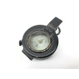 WWII Military compass in black japanned brass case, stamped on base EAC, No.