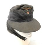 WW2 German Luftwaffe M-43 field cap, blue wool with one piece eagle and cockade insignia,