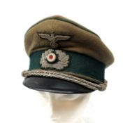 German Wermacht Technical Services cap with embroidered badges, black peak green band and piping,