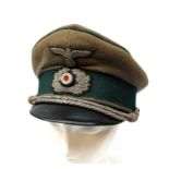German Wermacht Technical Services cap with embroidered badges, black peak green band and piping,