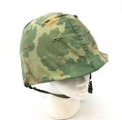 American steel helmet, composite liner with adjustable webbing and chinstrap.