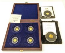 Cased set of four miniature 14ct gold medallions 'Year of Three Kings',