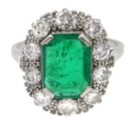 Platinum emerald cut emerald and diamond cluster ring,