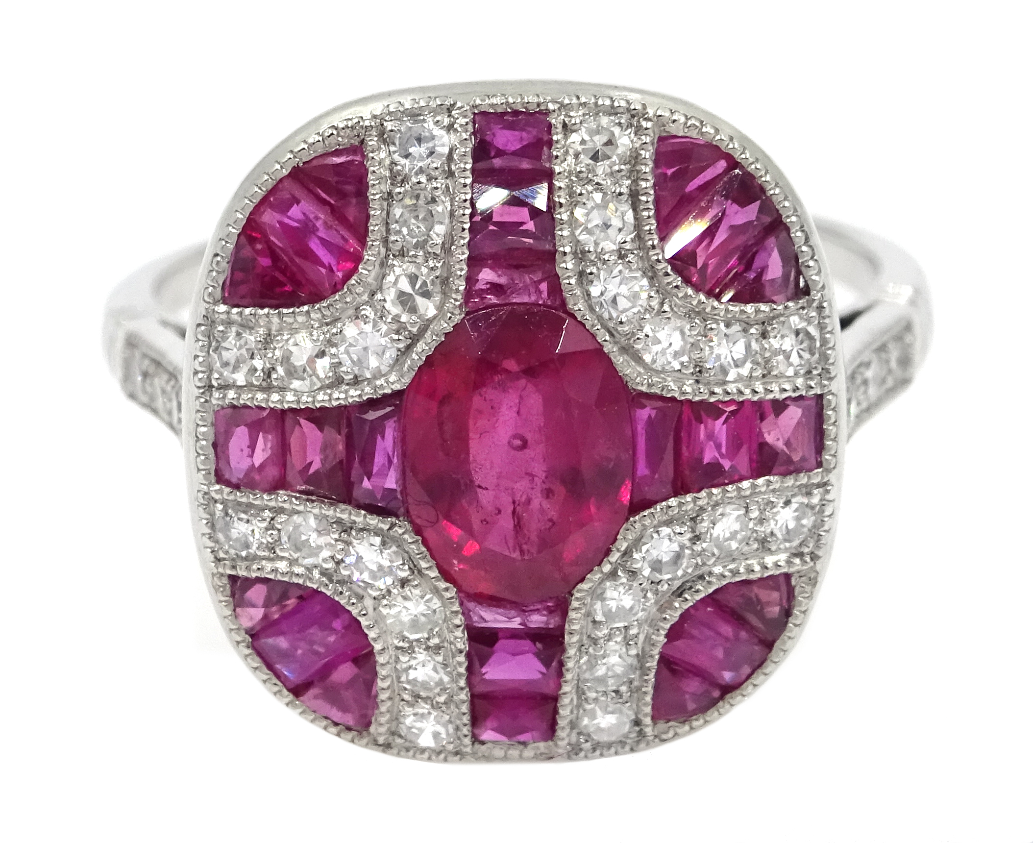 Platinum ruby and diamond panel dress ring Condition Report Tested as platinum,