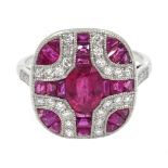 Platinum ruby and diamond panel dress ring Condition Report Tested as platinum,