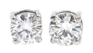 Pair of 18ct gold round brilliant cut diamond stud earrings, diamond total weight approx 1.